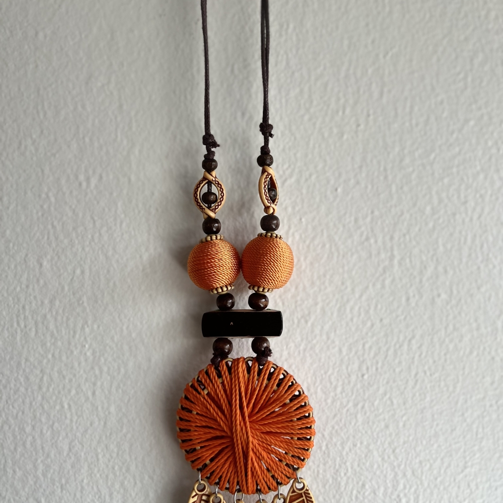 Elegant Orange and Black Pendant Necklace
